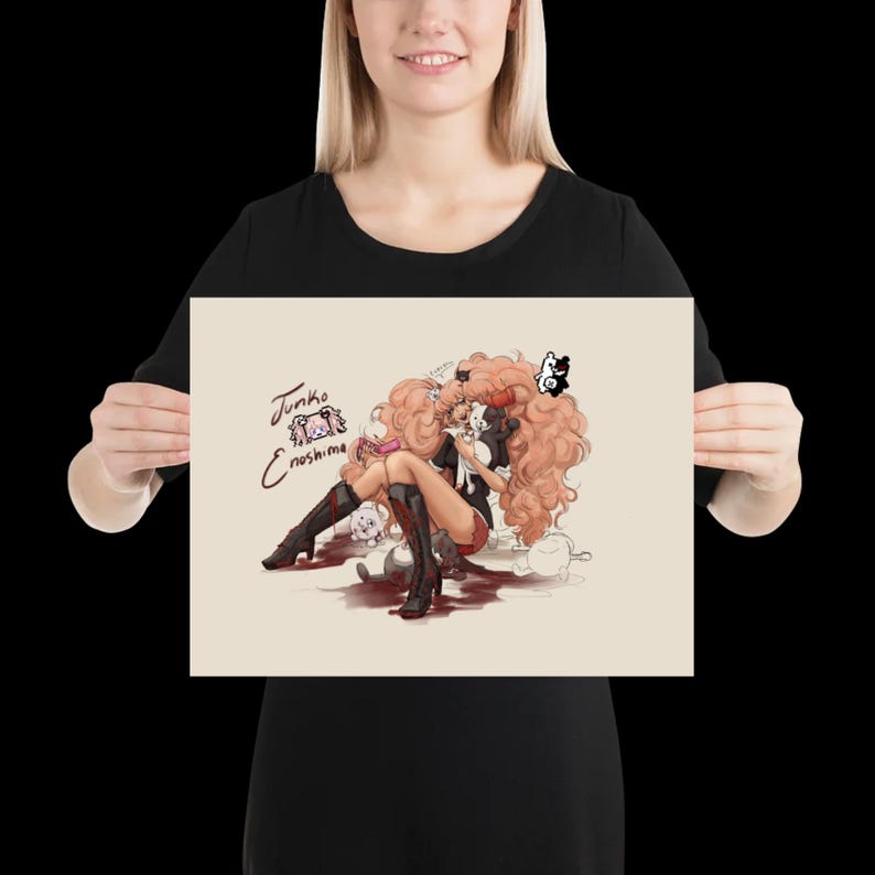May include: A rectangular art print featuring an illustration of the character Junko Enoshima with voluminous blonde hair, wearing black boots and a dark outfit, surrounded by small white bear figures and red splatters, with the text Junko Enoshima.