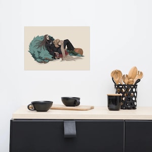May include: A rectangular art print featuring a digital illustration of two figures resting against a large, teal, furry creature. One figure has long dark hair and wears black clothing, while the other has long blonde hair and wears a tan garment.