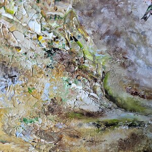May include: An abstract oil painting on canvas featuring thick, textured impasto layers in shades of beige, tan, brown, and white. A small, detailed hummingbird with red, green, and white plumage is depicted in flight on the right side of the composition.