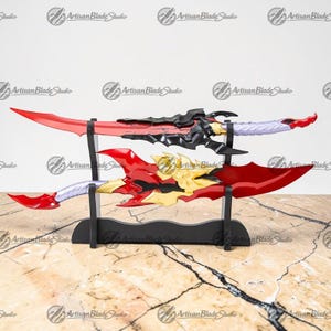 May include: Two decorative fantasy swords with red and black blades, displayed on a black stand. The top sword has a red blade with black accents, while the bottom sword features red and gold details. The handles are silver and white.