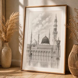 Könnte beinhalten: Gerahmte Bleistiftzeichnung einer Moschee mit mehreren Minaretten und Kuppeln, die sich im Wasser spiegeln. Das Kunstwerk befindet sich in einem Holzrahmen. Die Szene ist in Schwarzweiß gehalten.