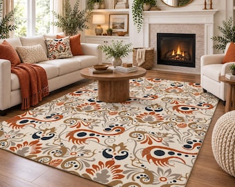 Vintage paisley area rug Boho bedroom rug Warm neutral living room Rust orange botanical area rug Eclectic home decor Bohemian floral rug