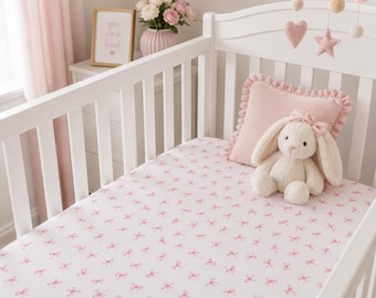 Pink bow fitted crib sheet for girl nursery Pink nursery decor Baby girl nursery bedding Tiny pink bow fitted crib sheet Pink crib sheet