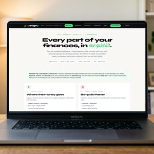 May include: A laptop computer displaying the Ledgerly website on its screen. The webpage features the text Every part of your finances, in one quiet kit, along with sections titled Where the money goes and Get paid faster on a white background.