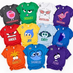 May include: Eleven short-sleeved t-shirts in various colors, each featuring a character graphic and name from the movie Inside Out. The shirts are numbered 1 through 11 and display characters including Embarrassment, Disgust, Nostalgia, Bing Bong, Anger, Joy, Envy, Ennui, Anxiety, Sadness, and Fear.