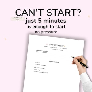 May include: A white sheet of paper with the text "CAN'T START?" and "just 5 minutes is enough to start". The paper includes a "5-MINUTE RESET" guide with instructions and a hand holding a pen.
