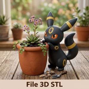 May include: A black and yellow Umbreon figurine leaning against a terracotta pot containing a green succulent with small purple flowers. A miniature metal shovel and several small smooth stones lie on the wooden surface next to the figurine. File 3D STL.