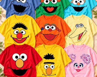 May include: A collection of nine short-sleeved t-shirts featuring various Sesame Street character faces, including Cookie Monster, Oscar the Grouch, Zoe, Bert, Prairie Dawn, Big Bird, Elmo, Ernie, and Abby Cadabby in vibrant colours.