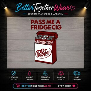 May include: A graphic design featuring a maroon box containing six red soda cans with the Dr Pepper logo. Above the box, the text reads PASS ME A FRIDGE CIG in maroon letters. The Dr Pepper logo is also displayed on the front of the box in white and red.