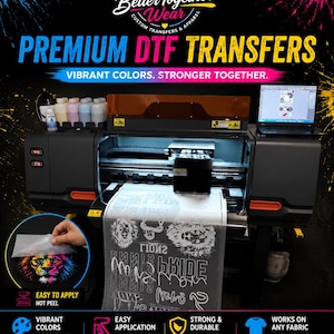May include: A DTF (Direct to Film) printer with the text "PREMIUM DTF TRANSFERS" and "VIBRANT COLORS. STRONGER TOGETHER." The image shows a printed sheet with various designs, including a colorful lion. Additional text includes "EASY TO APPLY," "VIBRANT COLORS," and "STRONG & DURABLE."