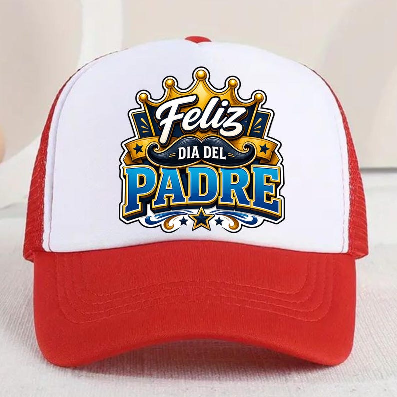 May include: Red and white trucker hat with a mesh back. The front panel displays the text "Feliz Dia Del Padre" in a blue and gold design, with a crown and mustache graphic.