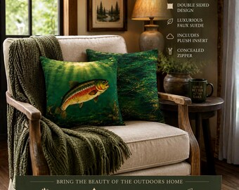 May include: Two square throw pillows featuring a trout fish graphic on a dark green background. The pillows are part of the River Lodge Collection, made of faux suede with a concealed zipper and plush insert. The design is double-sided.