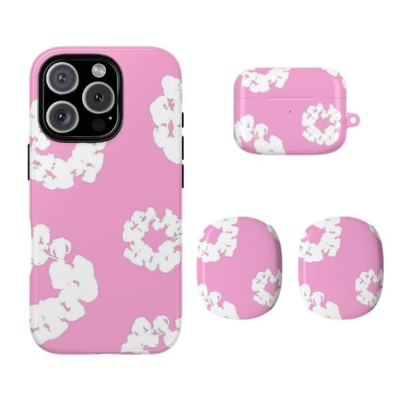 May include: A pink phone case, AirPod case, and two AirPod covers with a white floral pattern. The phone case has a camera cutout and black side accents. The AirPod case has a small loop for attachment.