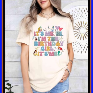Adult wearing a birthday girl t-shirt with “It’s me, hi, I’m the birthday girl, it’s me” text and colorful Disney princess graphics, perfect for birthday party outfits, theme park trips, family matching looks, and magical birthday gifts for girls, teens, and women.