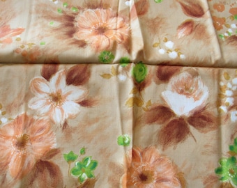 orange and green on light tan abstract floral print vintage cotton fabric