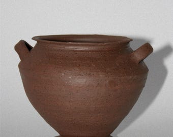 Jarrón pequeño de terracota con forma de ánfora