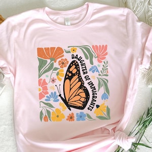 Camiseta del Movimiento de Resistencia, Camiseta de la Hija de Inmigrantes, Camiseta de Protesta Callejera, Camiseta de Resistencia Comunitaria, Camiseta de Protesta contra la Política Fronteriza de EE. UU. imagen 1