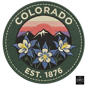 May include: A circular embroidered patch featuring a dark green border with the text COLORADO at the top and EST. 1876 at the bottom. The center displays a mountain range under a sunset sky with three blue and white columbine flowers in front.