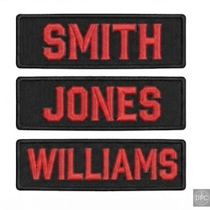 May include: Three rectangular embroidered patches with black fabric backgrounds and red stitched borders. Each patch features bold, red, capitalized text reading SMITH, JONES, and WILLIAMS respectively, centered in a block-style font.