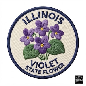 Op de afbeelding: Een ronde geborduurde patch met een crèmekleurige achtergrond en een donkerblauwe rand. Het ontwerp toont paarse viooltjes met gele harten en groene bladeren. De tekst luidt ILLINOIS VIOLET STATE FLOWER in het donkerblauw.