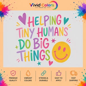 May include: A graphic print featuring the text HELPING TINY HUMANS DO BIG THINGS in multi-colored, hand-lettered style font. The design includes a yellow smiley face, small hearts, and stars, set against a light background with paint splatters.