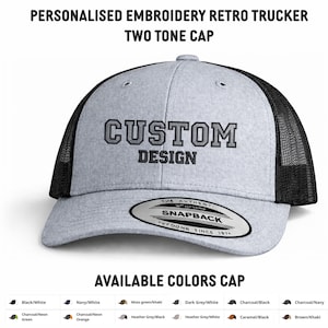 May include: A grey and black retro trucker cap with the embroidered text "CUSTOM DESIGN". The cap has a mesh back and a snapback closure. The text "PERSONALISED EMBROIDERY RETRO TRUCKER TWO TONE CAP" is at the top. Available in various colours.