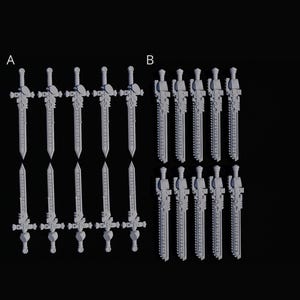 May include: A white ceramic mug with a black handle and the text "But First, Coffee" in a handwritten style. The mug is on a white surface. The mug is 4 inches tall.