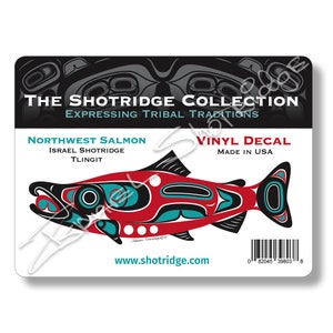May include: A white vinyl decal featuring a stylized Northwest Salmon design in red, black, and teal. The decal includes the text "THE SHOTRIDGE COLLECTION" and "EXPRESSING TRIBAL TRADITIONS". The text "NORTHWEST SALMON" and "VINYL DECAL" are also present.