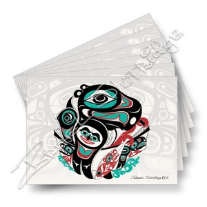 May include: A set of six cards featuring a colourful, stylised illustration of a raven with a fish in its beak. The raven is surrounded by geometric patterns in shades of black, red, teal, and white. The text "Samuel Shekalige ©22" is printed in the bottom right corner.