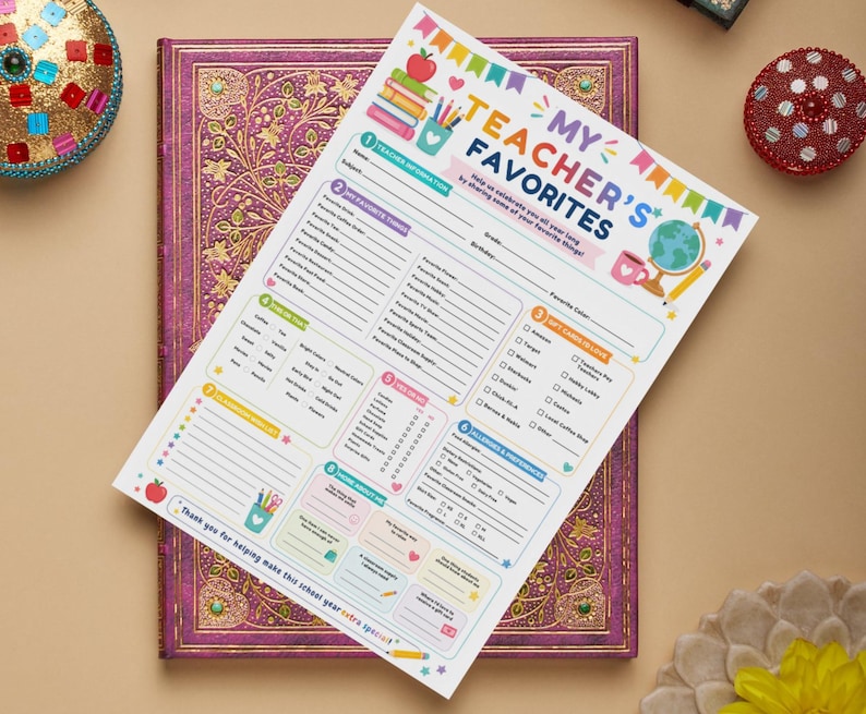 May include: A white paper questionnaire titled My Teacher's Favorites with colorful illustrations of books, a globe, and a coffee mug. The form includes sections for teacher information, favorite things, gift cards, this or that choices, and allergies.