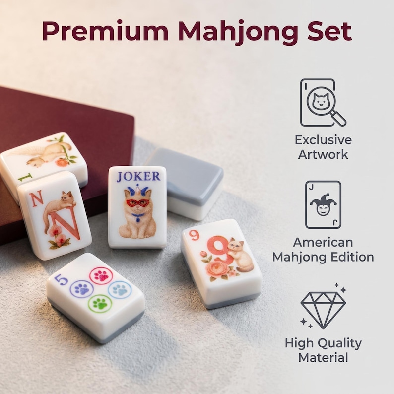 May include: A Premium Mahjong Set featuring white tiles with cat illustrations, floral accents, and paw prints. Tiles include a Joker card, the letter N, and the number 9. Text includes Exclusive Artwork, American Mahjong Edition, and High Quality Material.
