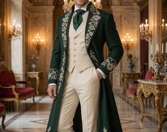 May include: A long dark green coat featuring white floral embroidery along the lapels, cuffs, and hem. The coat is worn over a cream-colored vest, a white collared shirt, a dark green cravat, cream-colored trousers, and white dress shoes.
