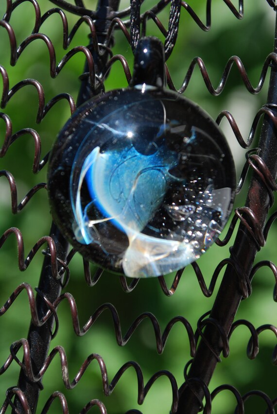 Items similar to Cosmic Chaos Pendant on Etsy