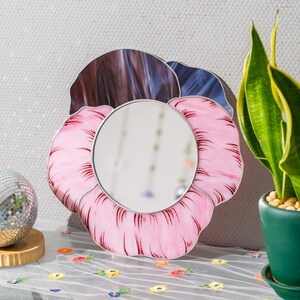 Pink stained glass pansy mirror close up with hand painted petal details