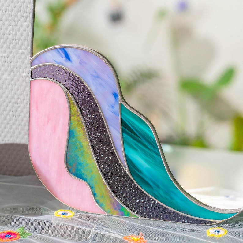 Stained glass mirror corner detail with textured glass and soft pastel colors modern handmade decor