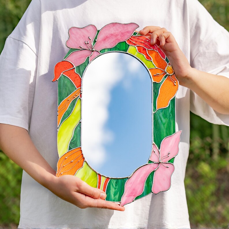 Custom stained glass floral mirror infographic with size options and design details