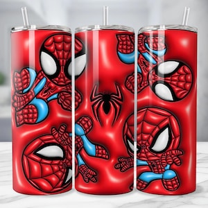 May include: A set of three red insulated tumblers featuring a Spider-Man design. The design includes multiple illustrations of Spider-Man in various poses, along with a black spider emblem. Each tumbler has a clear straw and a silver lid.