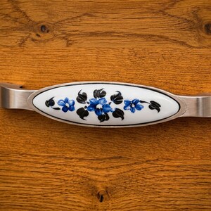 Vintage Ceramic Floral Kitchen Handles on Rustic Oak Cabinets for Home Decor Upgrade