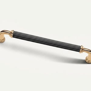 Tiradores de armario de lujo acanalados en negro y dorado, elegantes tiradores de puerta de cocina moleteados.