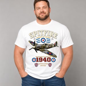 May include: White t-shirt featuring a graphic of a Supermarine Spitfire airplane. The design includes the text "Spitfire Legends of the Sky" and "1940" with British flag emblems. The airplane is olive green and gray.