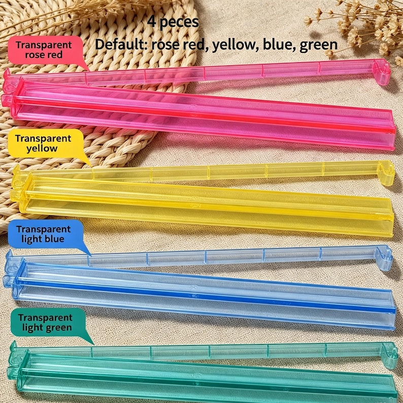 May include: A set of four long, transparent plastic bag sealing clips in rose red, yellow, light blue, and light green. The text on the image reads 4 pieces and Default: rose red, yellow, blue, green, indicating the color variety of the clips.