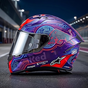 May include: A purple and red motorcycle helmet with a mirrored visor. The helmet features a circuit board design with the Red Bull logo and the text "Red". The helmet also has the text "STARLINE" and "100%."