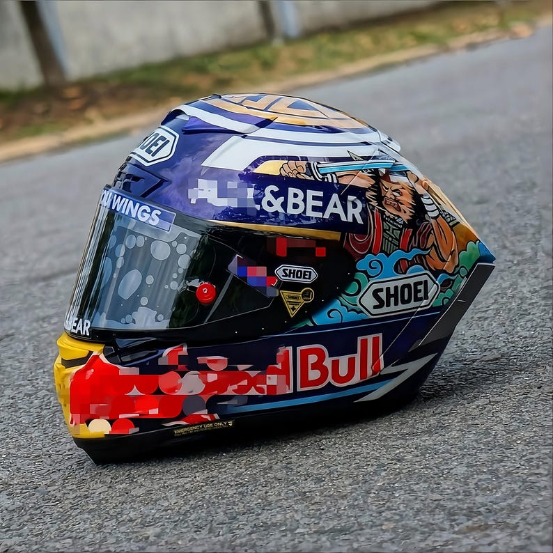 Close-up of the Spies Hecker clear coat finish on a custom airbrushed Shoei X-15 Marc Marquez helmet. High-reflection surface showing the depth of hand-painted MotoGP graphics. Industry-standard automotive paint durability for high-speed motorsport use. Premium custom-made helmet for fans of Shoei, Arai, and AGV seeking bespoke designs. Custom helmet art for enthusiasts in the United States and United Kingdom. Professional detail and luxury quality.