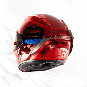 Custom airbrush Shoei X-15 Marc Marquez helmet displayed as a premium automotive collector's piece. High-gloss Spies Hecker finish reflecting elite craftsmanship. Perfect for home display or professional motorsport use. Authentic Shoei X-Fifteen performance with bespoke MotoGP artistry. Targeted at high-net-worth automotive collectors and dedicated Marc Marquez fans in the US, UK, and Australia. The ultimate luxury gift for superbike riders.
