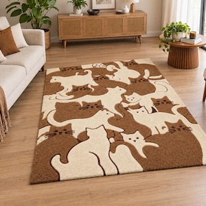 May include: A rectangular area rug featuring a repeating tessellated pattern of stylized cats in alternating shades of cream and brown. The design consists of interlocking cat silhouettes covering the entire surface of the floor covering.