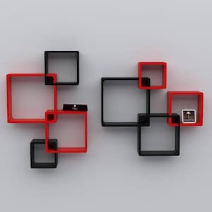 May include: Two sets of interlocking square wall shelves in matte black and bright red. The left set features three red squares and two black squares. The right set features two red squares and three black squares, with a small logo tag visible.