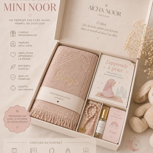 Peut inclure: Un coffret cadeau Mini Noor contenant un tapis de prière rose poudré brodé au nom d'Inaya, un livre intitulé J'apprends à prier, un tasbih en perles, un flacon de musc pour bébé et une carte personnalisée avec un motif d'arc-en-ciel.