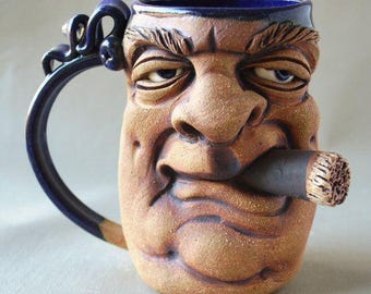 Archivo STL de taza con cara divertida