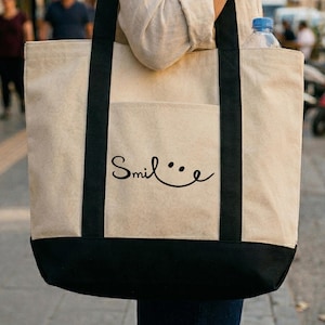 May include: A set of three ceramic mugs with a speckled, matte finish. The mugs are in shades of cream, light brown, and dark brown. Each mug has a simple, minimalist design, perfect for coffee or tea.