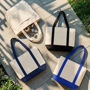 Puede incluir: Un juego de tres tazas de cer&aacute;mica con un acabado mate moteado. Cada taza presenta un color diferente: azul claro, crema y gris. Las tazas tienen un dise&ntilde;o simple y moderno con una forma redondeada y un asa.